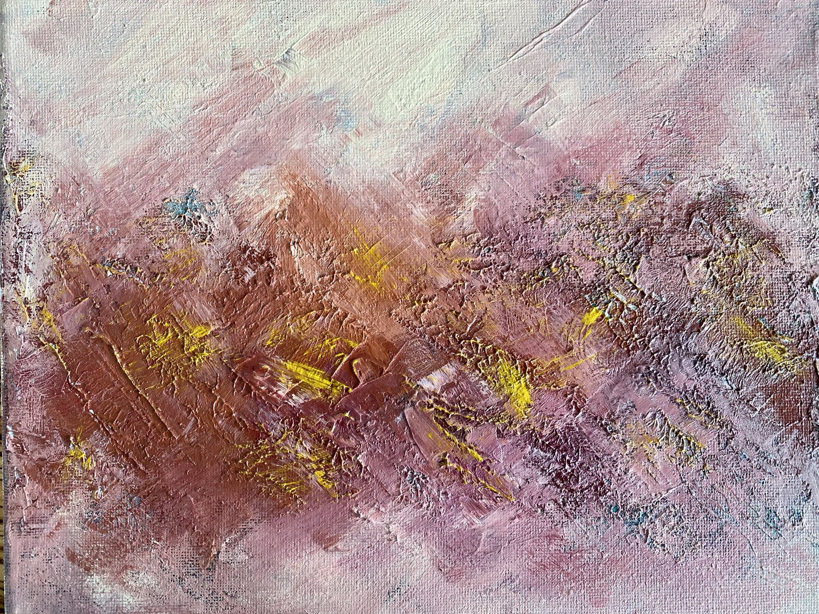 Textured non-objective painting in layered dusty rose and terracotta with flecks of bright yellow and touches of blue, fading to soft white at the top