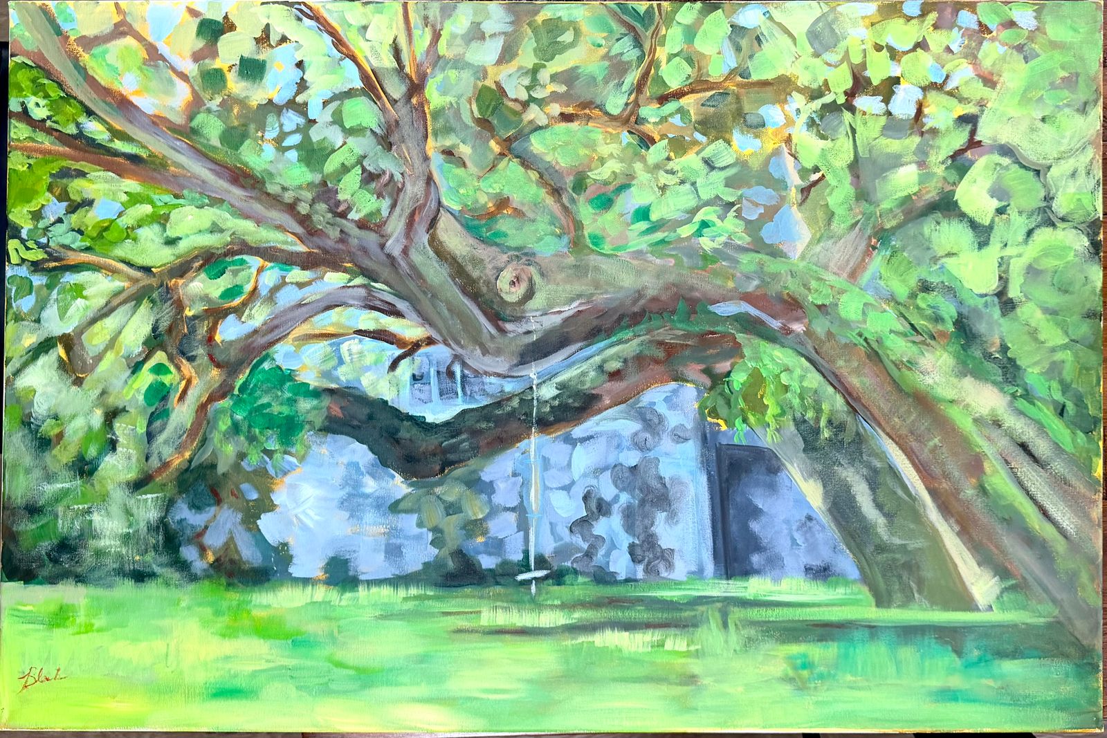 Signed painting on canvas of a sprawling tree with a rope swing hanging from a low branch over a sunlit green lawn, with a pale stone wall behind
